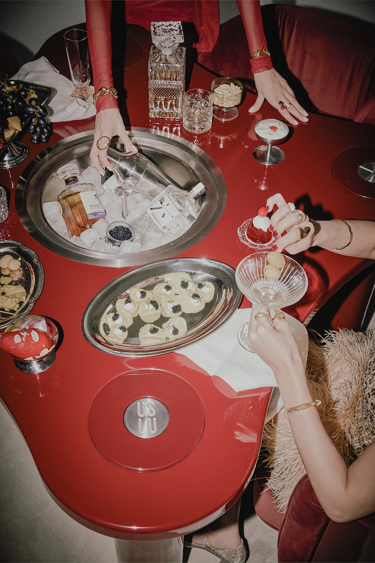 Dinner and drinks around The Socialite Dining and Drinks Table