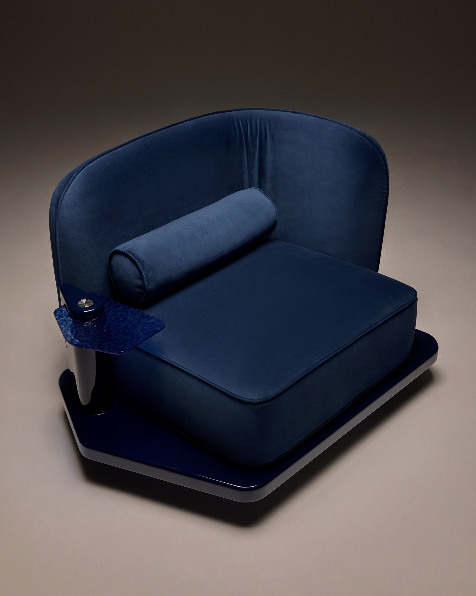The Laidback Lounge Chair, front view in blue velvet