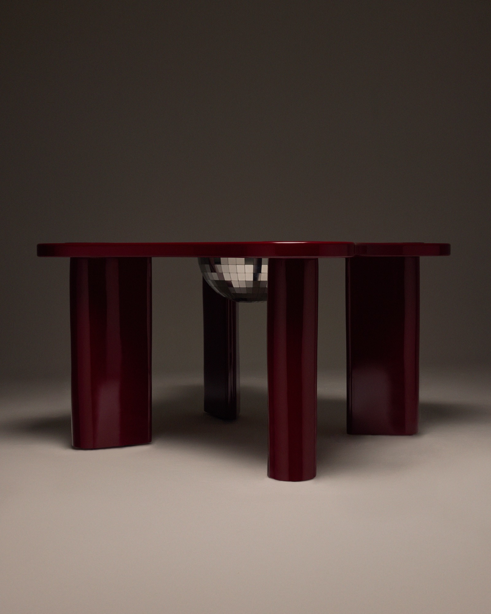 The Socialite Dining and Drinks Table, side view with the disco ball ice bucket