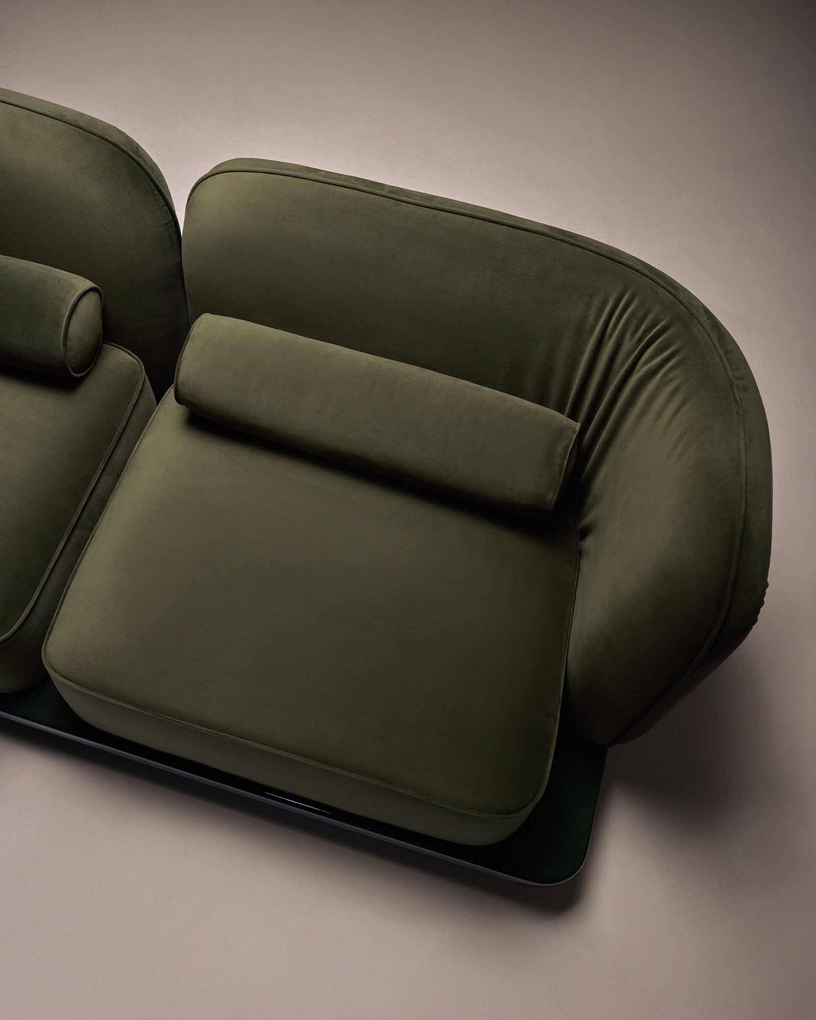 The Whisper Two-Seater Sofa, seat and gathered velvet backrest from above